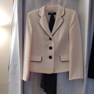 Kasper Suit With Yellow Jacket And Pleated Black Skirt